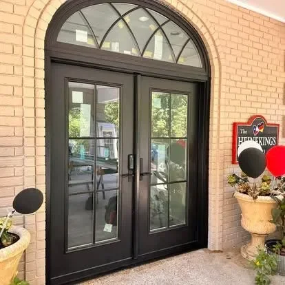 Black double entry doors installed by Going Green Concepts